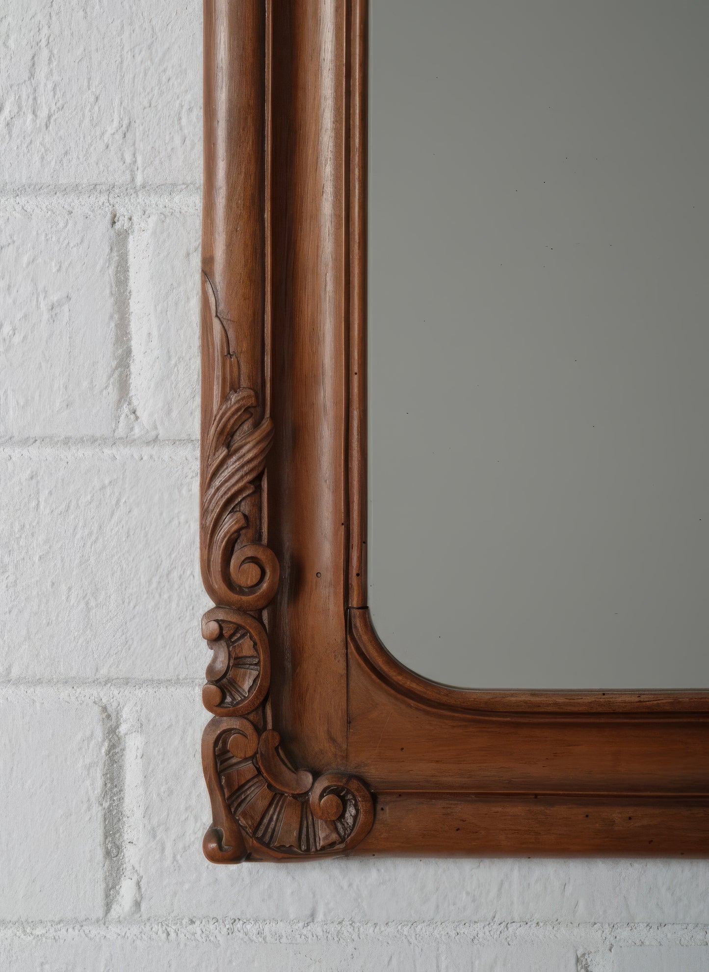 Continental European Hand-Carved Wood Mirror with Rococo-Inspired Crest
