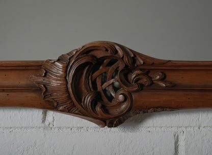 Continental European Hand-Carved Wood Mirror with Rococo-Inspired Crest