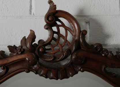 Continental European Hand-Carved Wood Mirror with Rococo-Inspired Crest