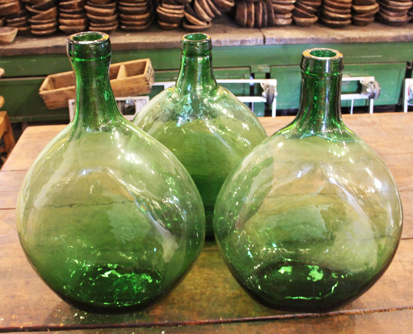 Demijohns -round green bottles